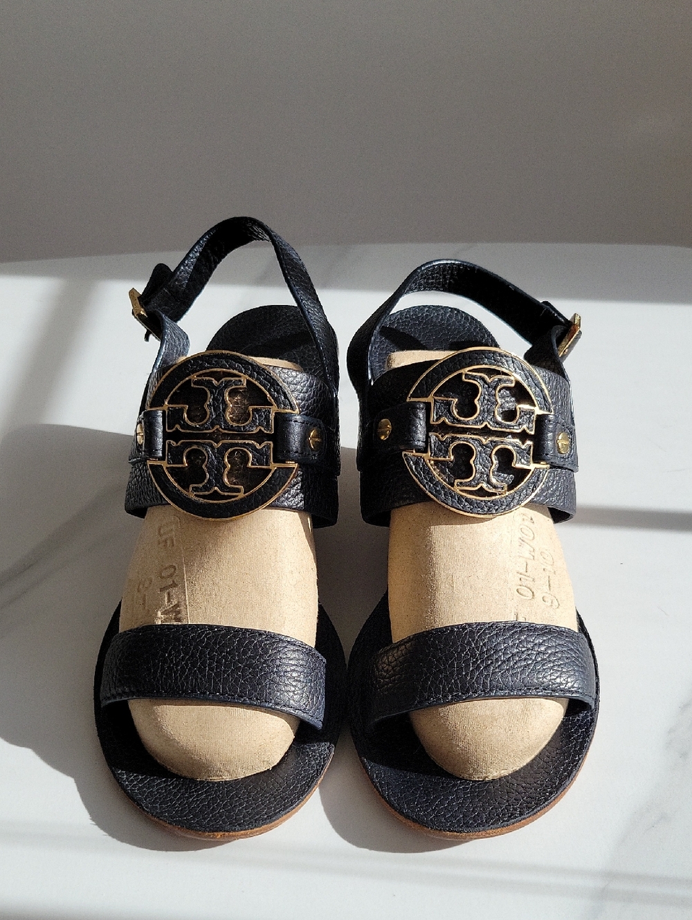 Tory Burch Black Leather Wedge Sandals with Gold Logo Accent